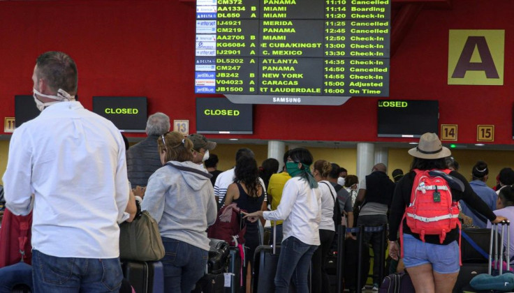 Airlines have cut services and there are waiting lists for flights out