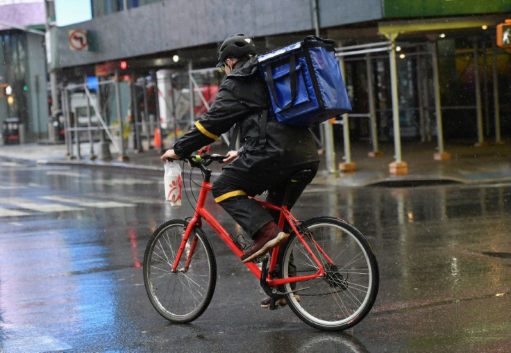 Food delivery jobs are a new options for laid off restaurant workers in the United States during the coronavirus crisis -- this bike courier is seen in New York