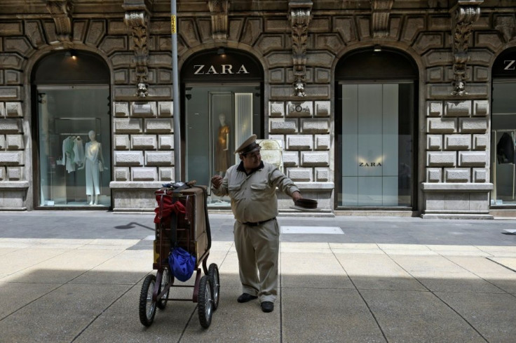 Street musician Luis Valdovinos is seen in Mexico City, where increasingly empty streets are making it harder for him to make a living