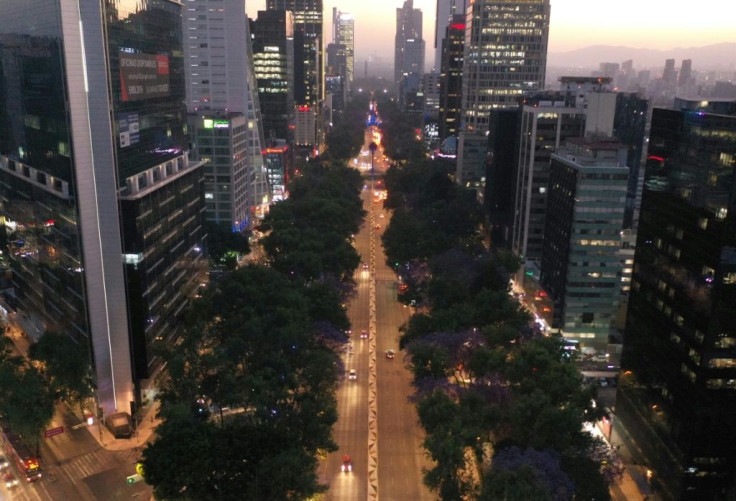 One of Mexico City's main arteries, Paseo de la Reforma, is nearly empty on the evening of March 23, 2020