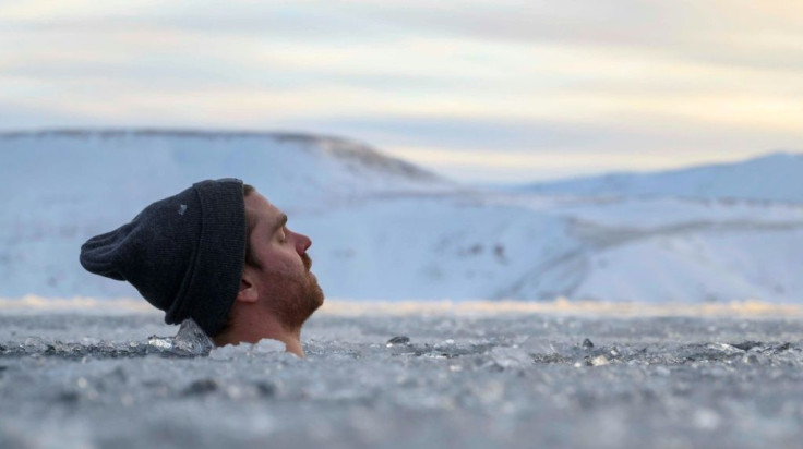 For two minutes participants endure the icy water, concentrating on inhaling and exhaling, and laud its wellness benefits