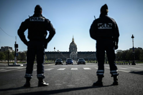 Paris police officers are carrying out checks of drivers as part of France's nationwide coronavirus lockdown.