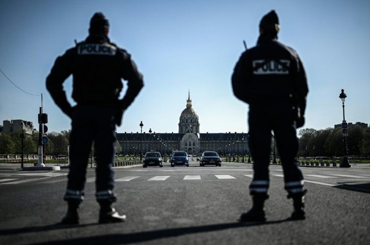 Paris police officers are carrying out checks of drivers as part of France's nationwide coronavirus lockdown.
