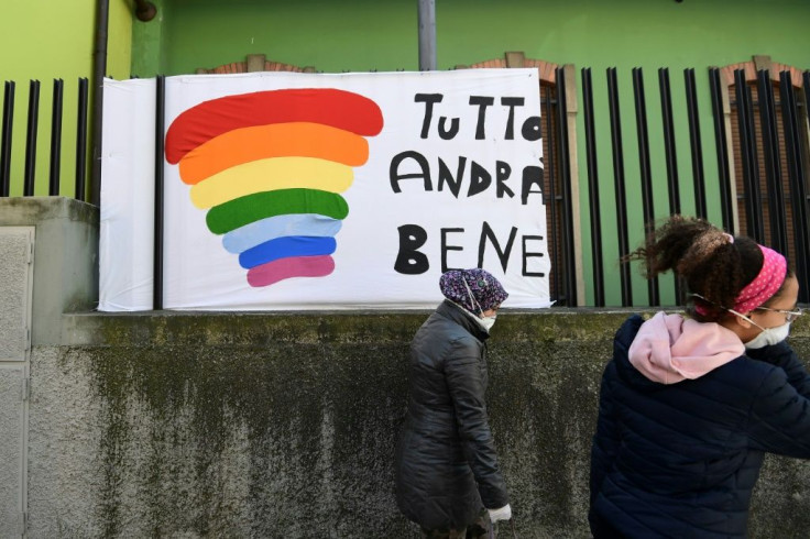 'Everything will be fine': children's drawings posted in the village offer a message of hope