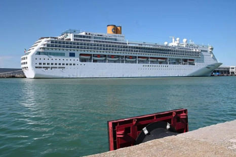 IMAGES Italy's Costa Cruises ship Costa Victoria docks at the port of Civitavecchia, some 70 kilometres northwest of Rome. Italy's Costa Cruises said it was isolating more than 700 guests on board its Victoria ship after one of them tested positive for th