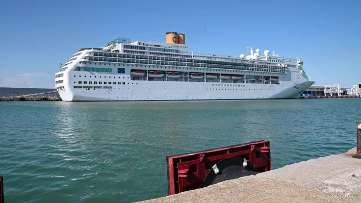 IMAGES Italy's Costa Cruises ship Costa Victoria docks at the port of Civitavecchia, some 70 kilometres northwest of Rome. Italy's Costa Cruises said it was isolating more than 700 guests on board its Victoria ship after one of them tested positive for th