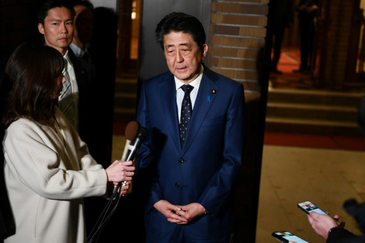 Japan's Prime Minister Abe is likely to ride out the storm of the Olympic postponement, analysts say