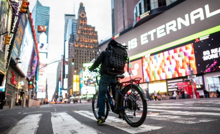 Fitch predicts the US economy will shrink by three percent this year as the coronavirus causes widespread joblessness and a recession