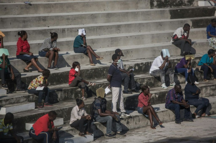 People attempt to practice social distancing in the Haitian capital Port-au-Prince, but it's not easy