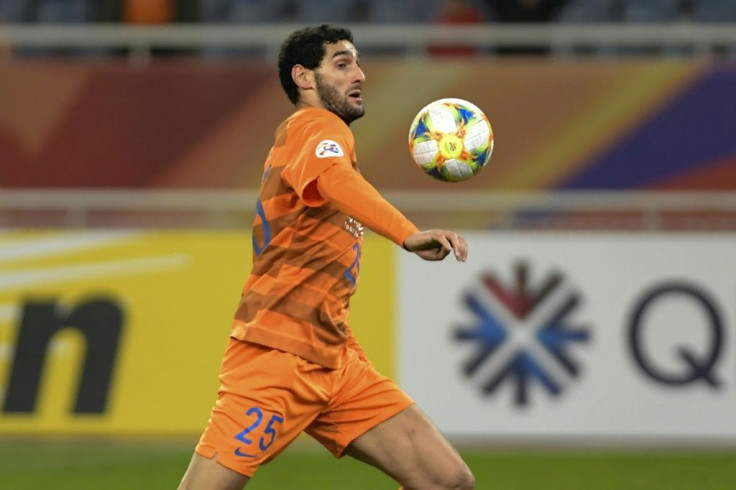 Shandong Luneng's Marouane Fellaini of Belgium is the first known coronavirus case in the CSL