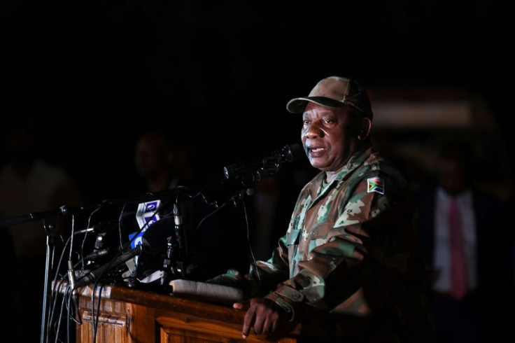 South African President Cyril Ramaphosa saw off soldiers before they deployed from a military base in Soweto township