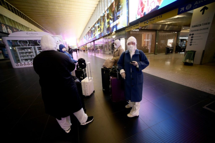 Travellers arrive in Termini central station in Rome during Italy's lockdown