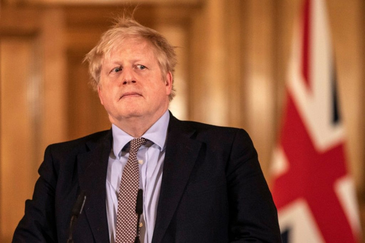 Prime Minister Boris Johnson says he is suffering mild symptoms