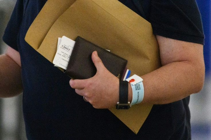 Governments are using various kinds of tracking such as these electronic bracelets in Hong Kong connected to an app to monitor people and curb the spread of COVID-19