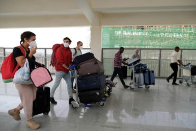 Foreign nationals were flying out of Nigeria's Abuja airport Sunday