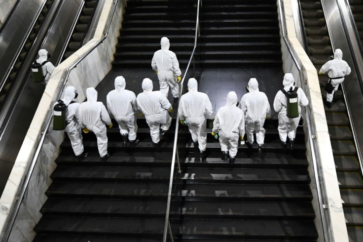 Brazilian soldiers disinfect the Subway Central Station in Brasilia on March 29, 2020