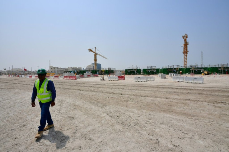 A worker on the construction site of the Ras Abu Aboud Stadium, one of the venues for the FIFA World Cup Qatar 2022, in the capital Doha