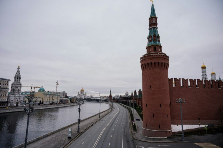 The streets of Moscow were nearly empty of traffic, apart from police patrols checking that people outside had a good reason