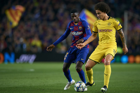  Ousmane Dembele (L) of Barcelona competes for the ball with Axel Witsel of Borussia Dortmund