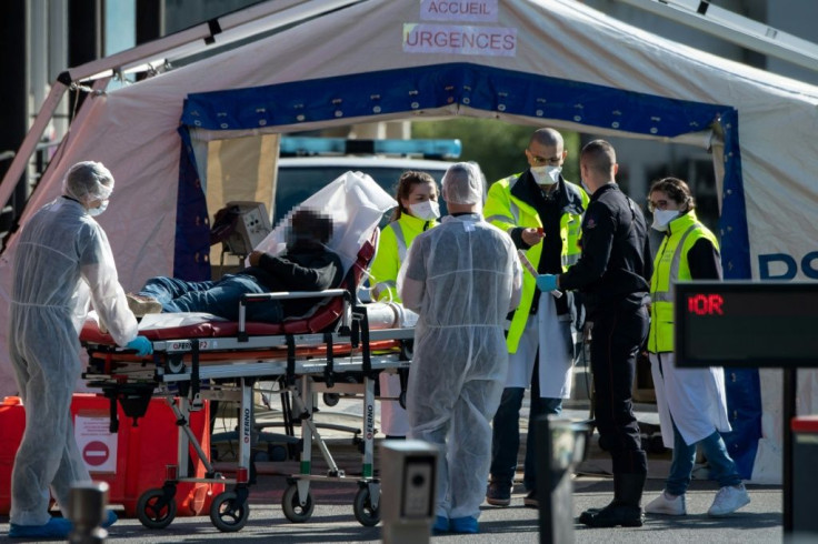 Doctors tend to a patient at the Henri Mondor Hospital in Creteil, near Paris,