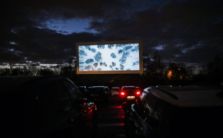 Cars pack a drive-in cinema in Essen, western Germany, after other cinemas were closed in an attempt to limit the spread of the coronavirus