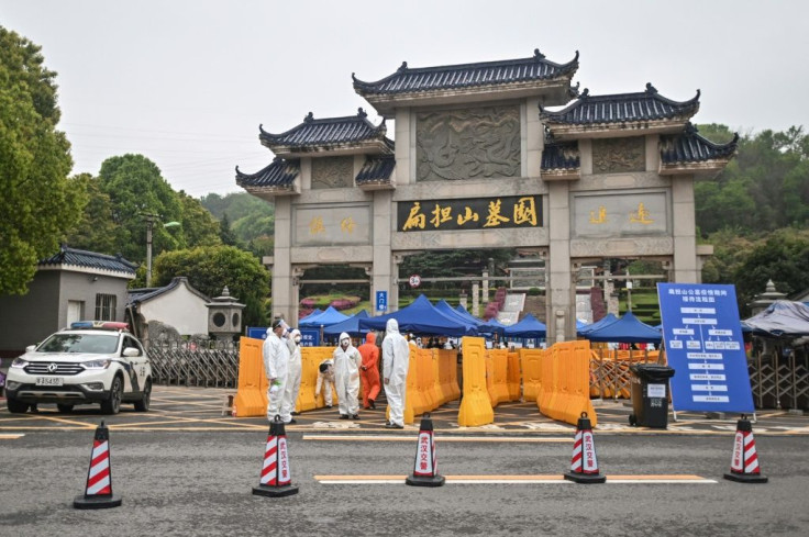 As the lockdown in China's virus epicentre Wuhan was eased, for many the first outdoor act in more than two months was to bury loved ones