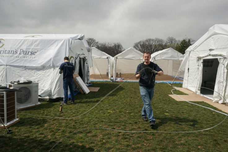 Volunteers set up an emergency field hospital in New York City's Central Park to help patients suffering from COVID-19