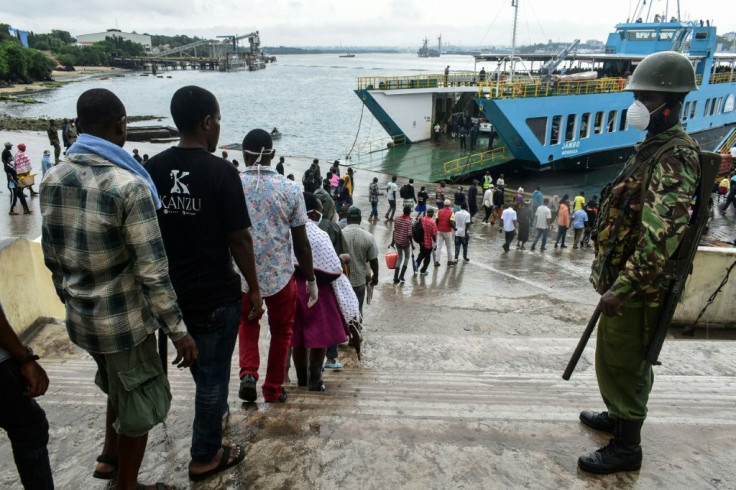 The Kenyan port city of Mombasa has seen police firing tear gas and whipping those out after curfew