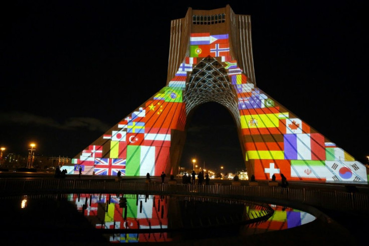 Iran's Azadi (Freedom) Tower is lit up with flags and messages of hope in solidarity with all the countries affected by the COVID-19 coronavirus pandemic