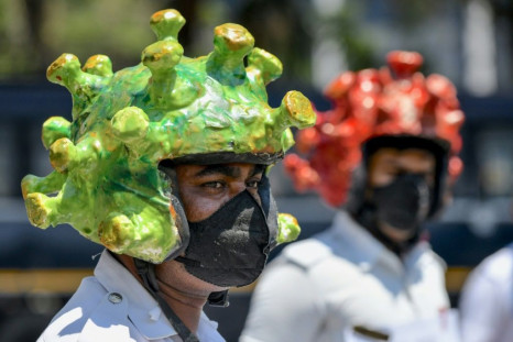 These Indian police are hoping their eye-catching helmets will help educate people on the dangers of the coronavirus but virus pranks and jokes for April Fools' Day are strictly off the table