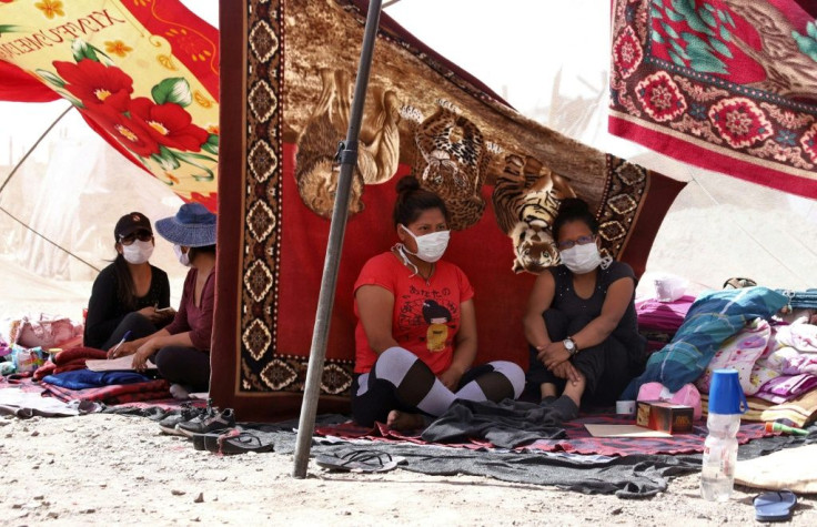 Bolivians stranded at a makeshift camp in Huara, Chile, after the border was closed to prevent the spread of the coronavirus, on April 1 2020