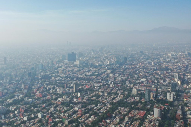 Air pollution in Mexico City. Global CO2 emissions need to drop 45 percent by 2030 and reach 'net zero' by 2050 to limit temperature rises at 1.5 degrees Celsius