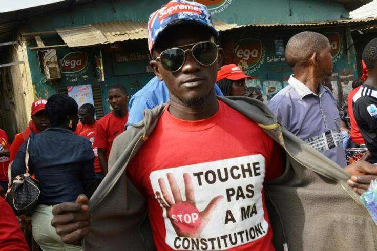 A protestor at a January rally wears a T-shirt reading 'Don't Touch My Constitution!' Conde's proposal to change the constitution has been hugely controversial