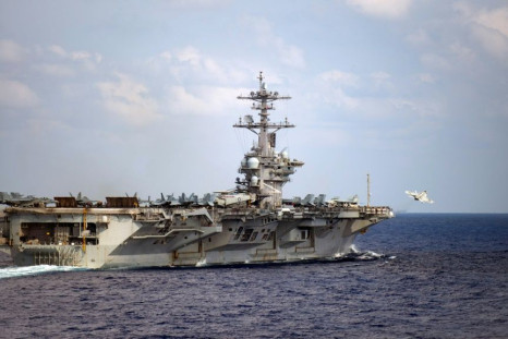 The USS Theodore Roosevelt aircraft carrier is in dock in Guam after an outbreak of Covid-19 infected at least 114 crew members