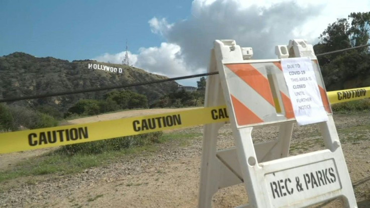 IMAGESImages of the famed Hollywood landmark on Mount Lee in the Hollywood Hills, and the yellow tape blocking access to the popular hiking trails around it - a visible sign of how the coronavirus pandemic is changing life in Los Angeles.