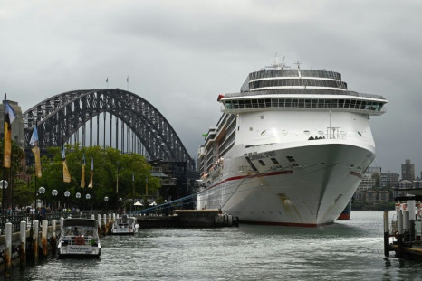 More than a dozen cruise ships are believed to be off Australia's coast, carrying around 15,000 crew and some experiencing outbreaks of coronavirus