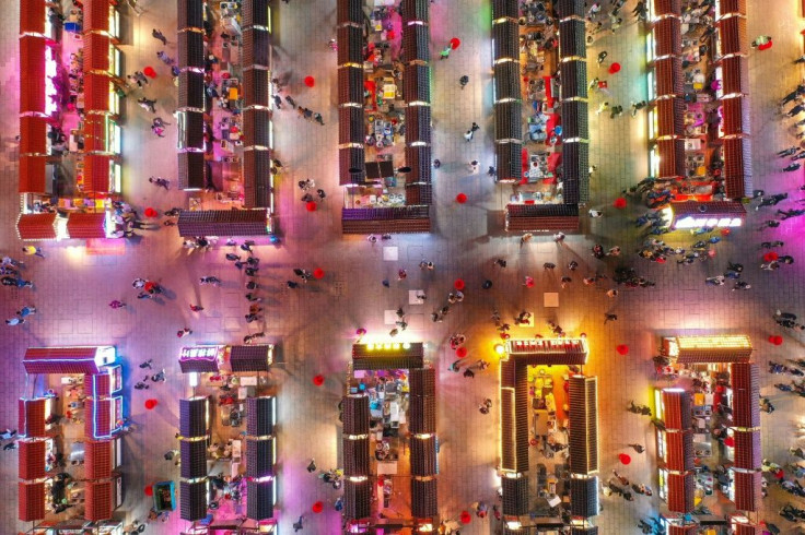 Crowds visit a night market in Shenyang in China's northeastern Liaoning province