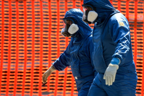 Russian army specialists outside a nursing home in the Lombardy region, the epicentre of the coronavirus outbreak in Italy