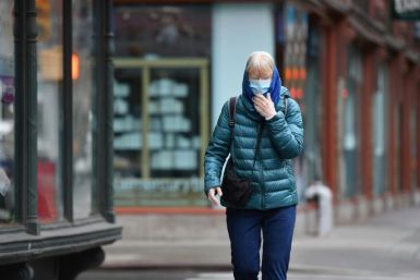 A New Yorker wears a face mask on the street