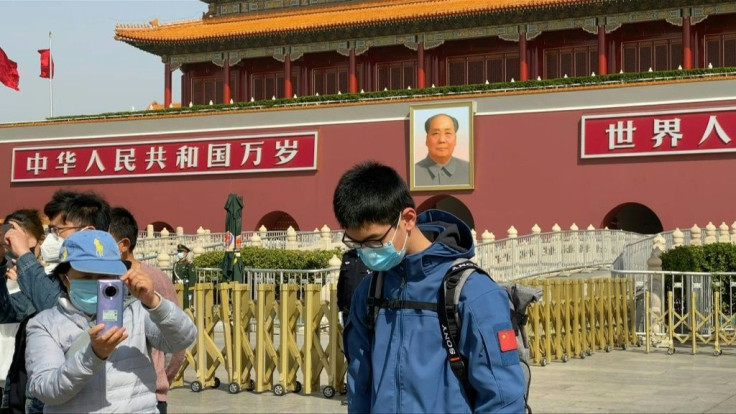IMAGES of people by Tiananmen SquarePeople gather by Tiananmen Square in Beijing to stand still and observe a nationwide three minutes of silence for coronavirus victims and 'martyrs'. At 10am (0200GMT), sirens and horns sounded in front of the square in 