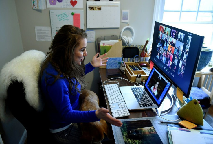 Lauryn Morley, a lower school substitute teacher for the Washington Waldorf School in Bethesda, Maryland, talks to a student on a Zoom conference