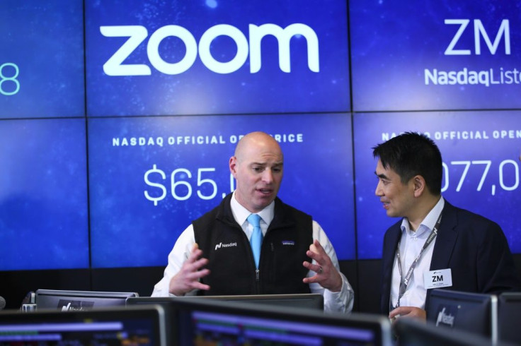 Zoom founder and CEO Eric Yuan (right) is seen at the Nasdaq market debut of the company in April 2019