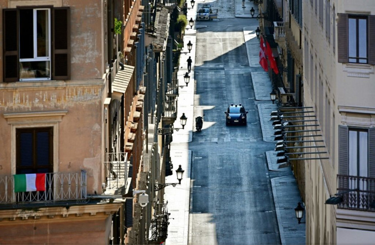 Police patrol the streets of Rome to ensure the lockdown is respected