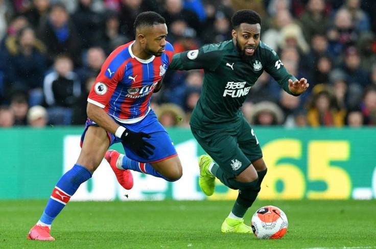 Newcastle's Danny Rose, right, defending against Crystal Palace, said he would take a pay cut but does not want to accept the blame