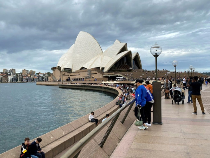 Some passengers on the Ruby Princess cruise ship were displaying flu-like symptoms when it berthed in Sydney Harbour