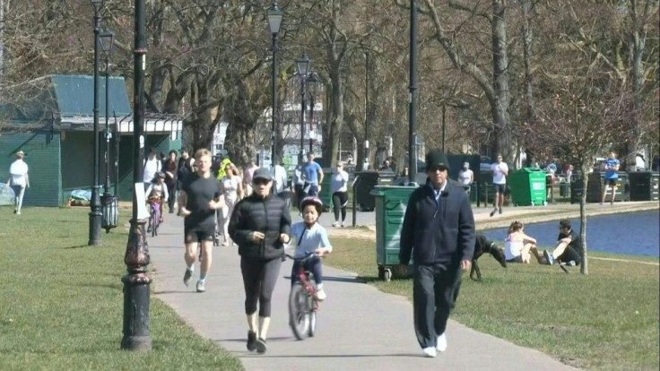 IMAGES A large number of people enjoy the warm weather in Clapham Common park in London despite the lockdown put in place in an effort to curb the spread of coronavirus. Britain's Health Secretary Matt Hancock on Sunday warned the government could ban out