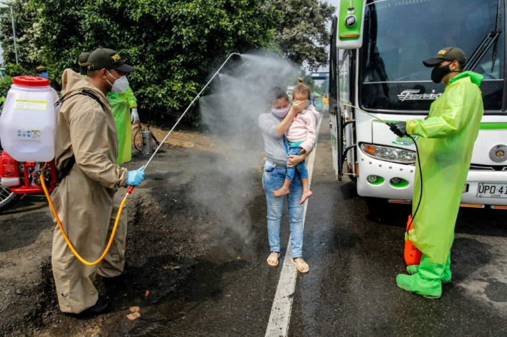 Colombian border police sprayed disinfectant on Venezuelan migrants returing home to prevent the spread of the deadly novel coronavirus