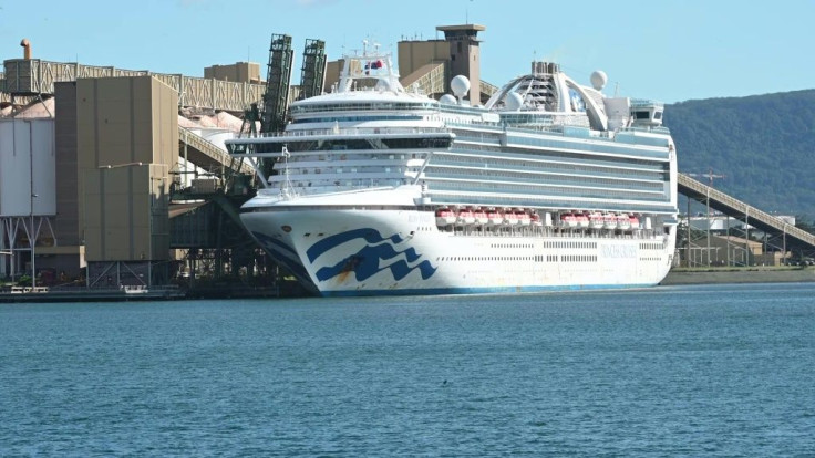 The Ruby Princess cruise ship sits docked at Port Kembla south of Sydney where it is expected to remain for several days after hundreds of crew showed symptoms of coronavirus. The local government hopes the days of quarantine and restocking at the port wi