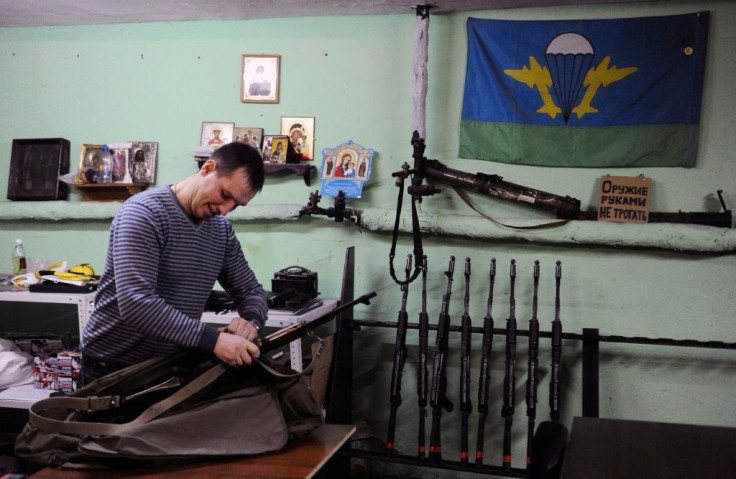 Denis Gariyev, a member of the Russian Imperial Movement who along with the group was designated as a terrorist by the US State Department, holds a weapon simulator at a training base in Saint Petersburg in 2015