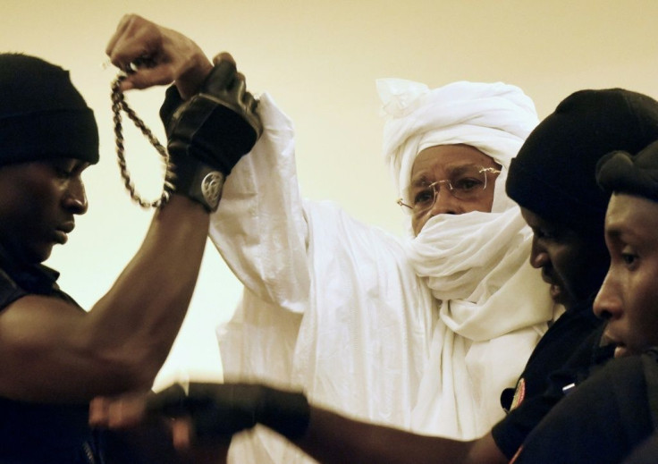 Former Chadian dictator Hissene Habre (C, pictured being escorted to court in 2015) has been granted two months' leave from prison as his jail is being used for new detainees in coronavirus quarantine